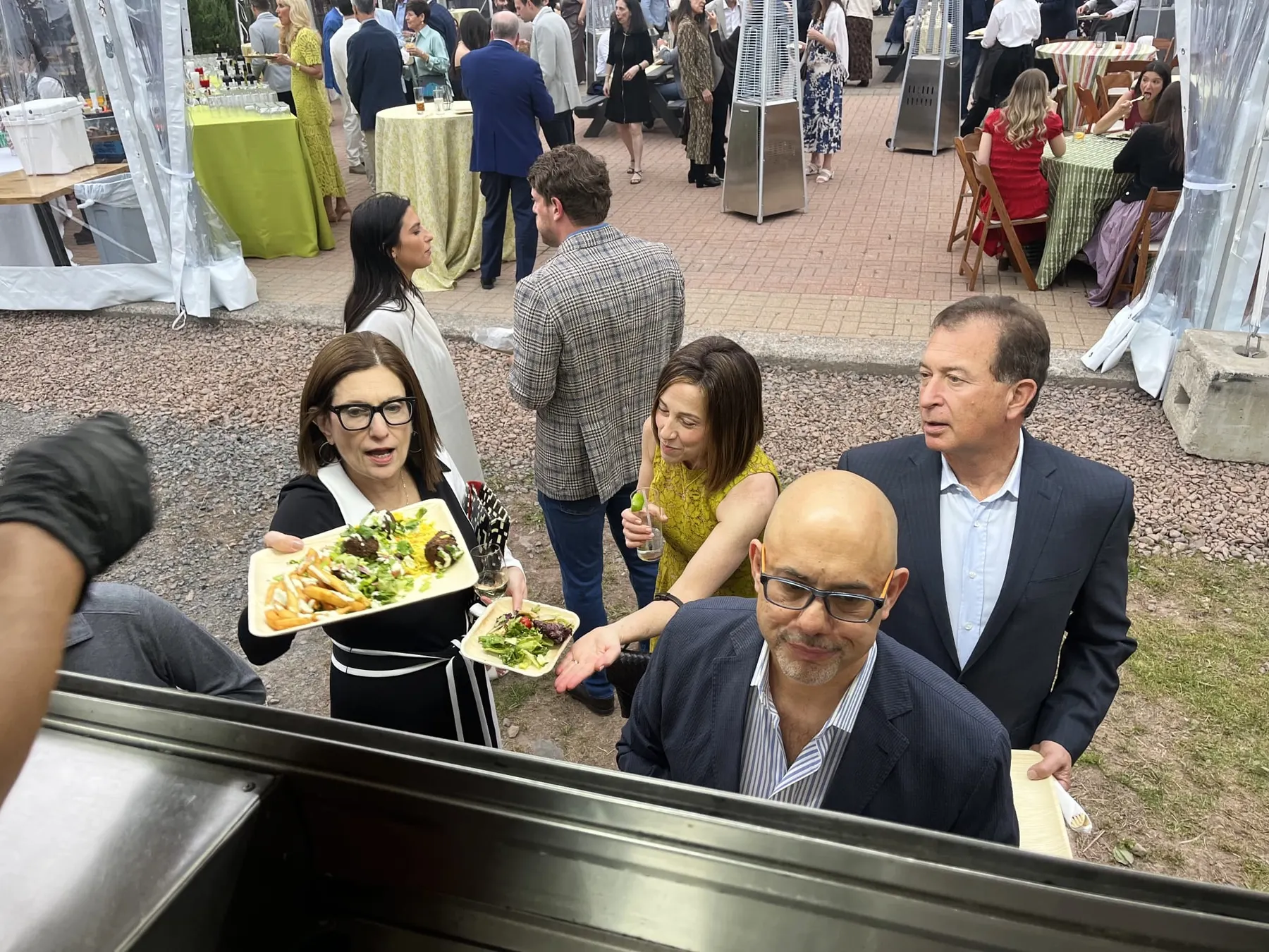 Guests being served at a catered event