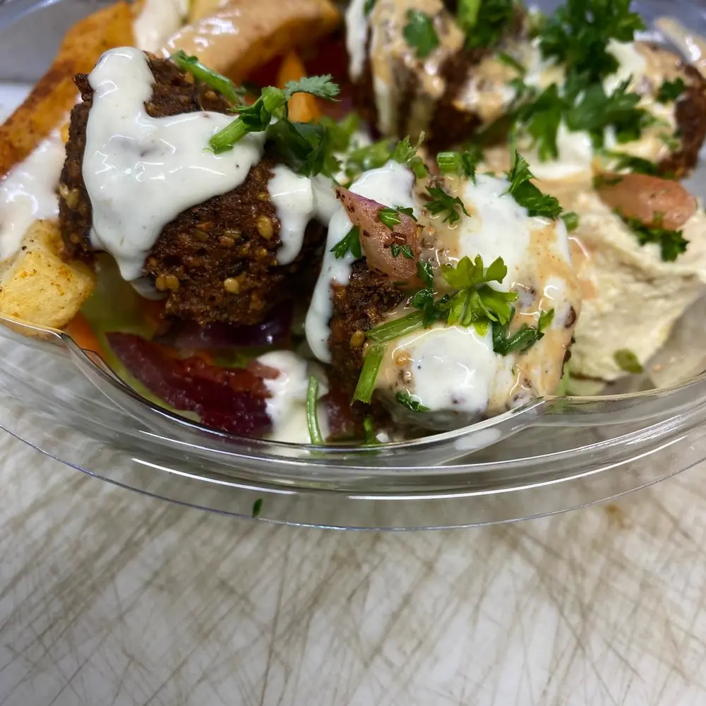 Kofta with tahini and parsley